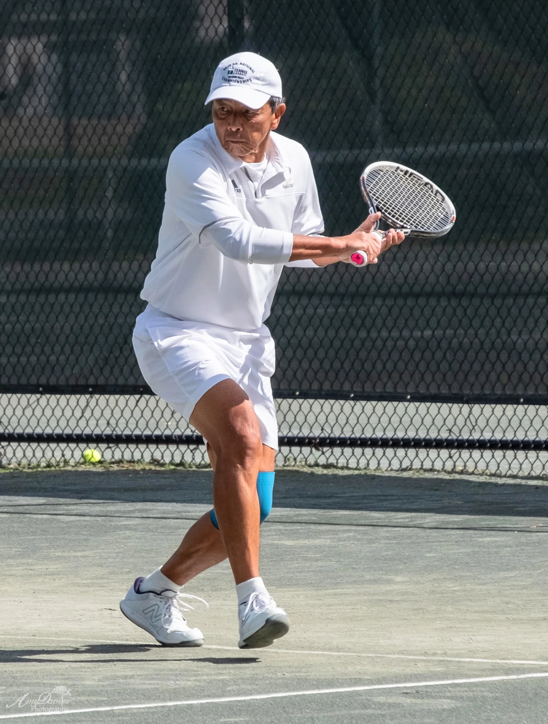 Mas playing singles in a local tournament at  Longfellow New Hampshire Tennis &amp; Swim Club