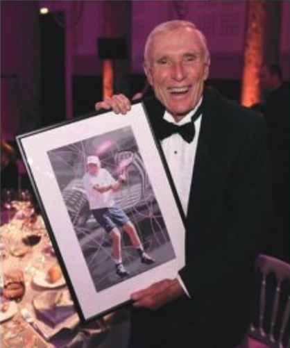 Collecting his ITF Seniors Award for Outstanding Achievement at the 2016 ITF World Champions Dinner