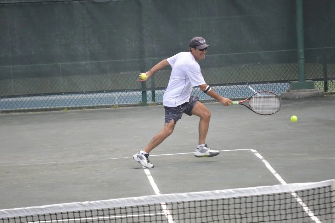 Selim Benbadis chases after a ball during his match at the Jack Dorsey Memorial Senior Tennis Tournament (Photo by Kyle Lutz )
