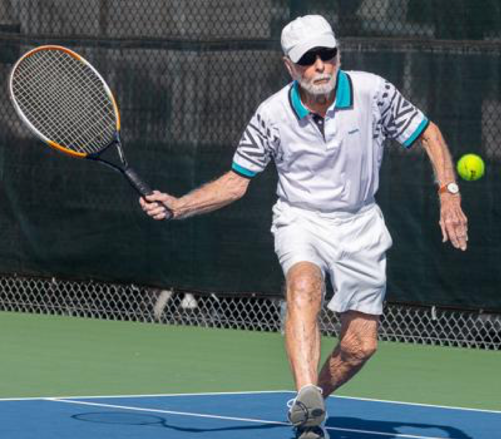 Tudor ApMadoc, 99, returns the ball during a doubles match at Desert Hills Center on Nov. 7, 2019. Photo-Bobby Joe Smith Special to the Green Valley News.