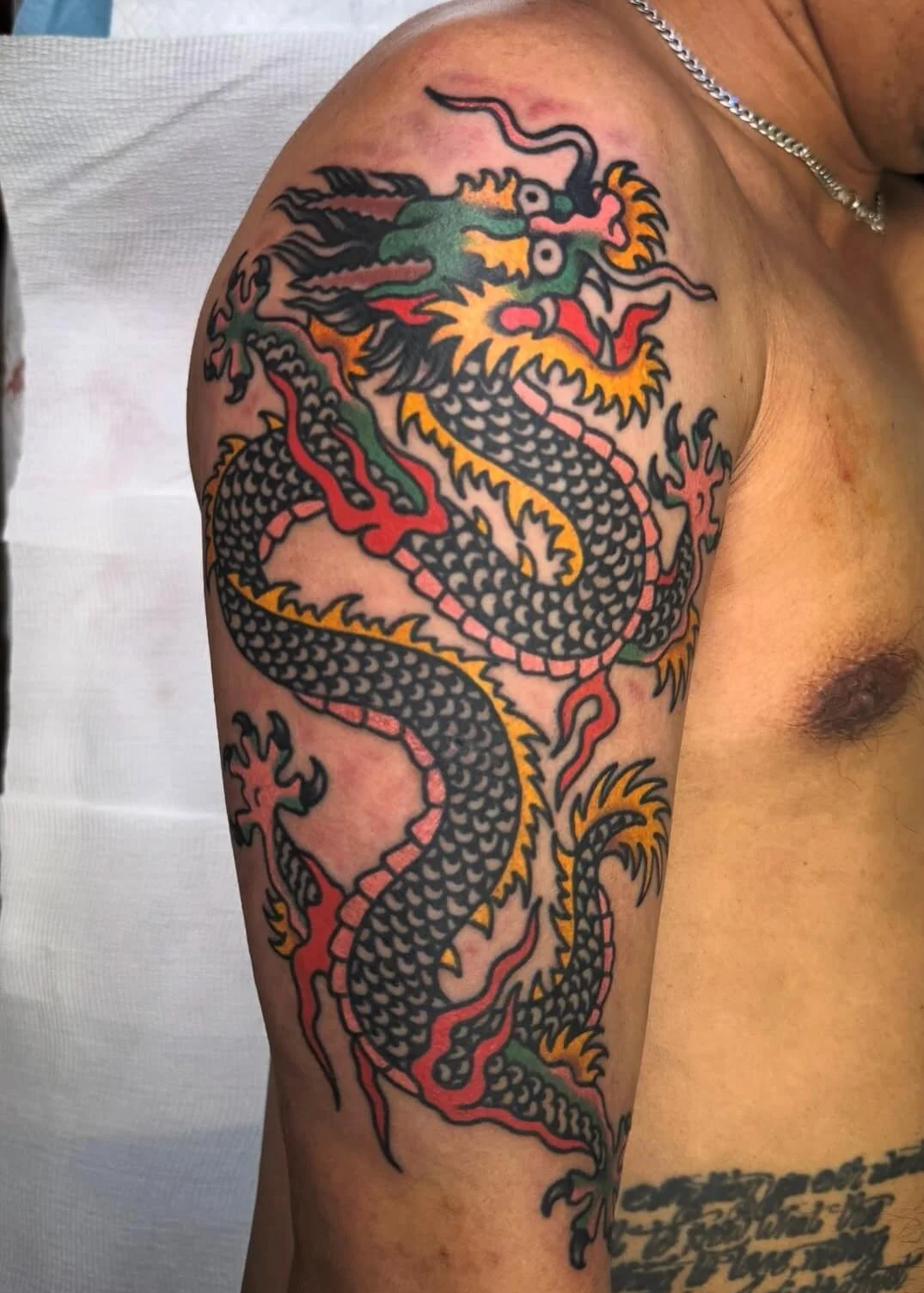 Mitch Oscar Sydney Traditional Tattoo Tibetan Dragon Upper Arm