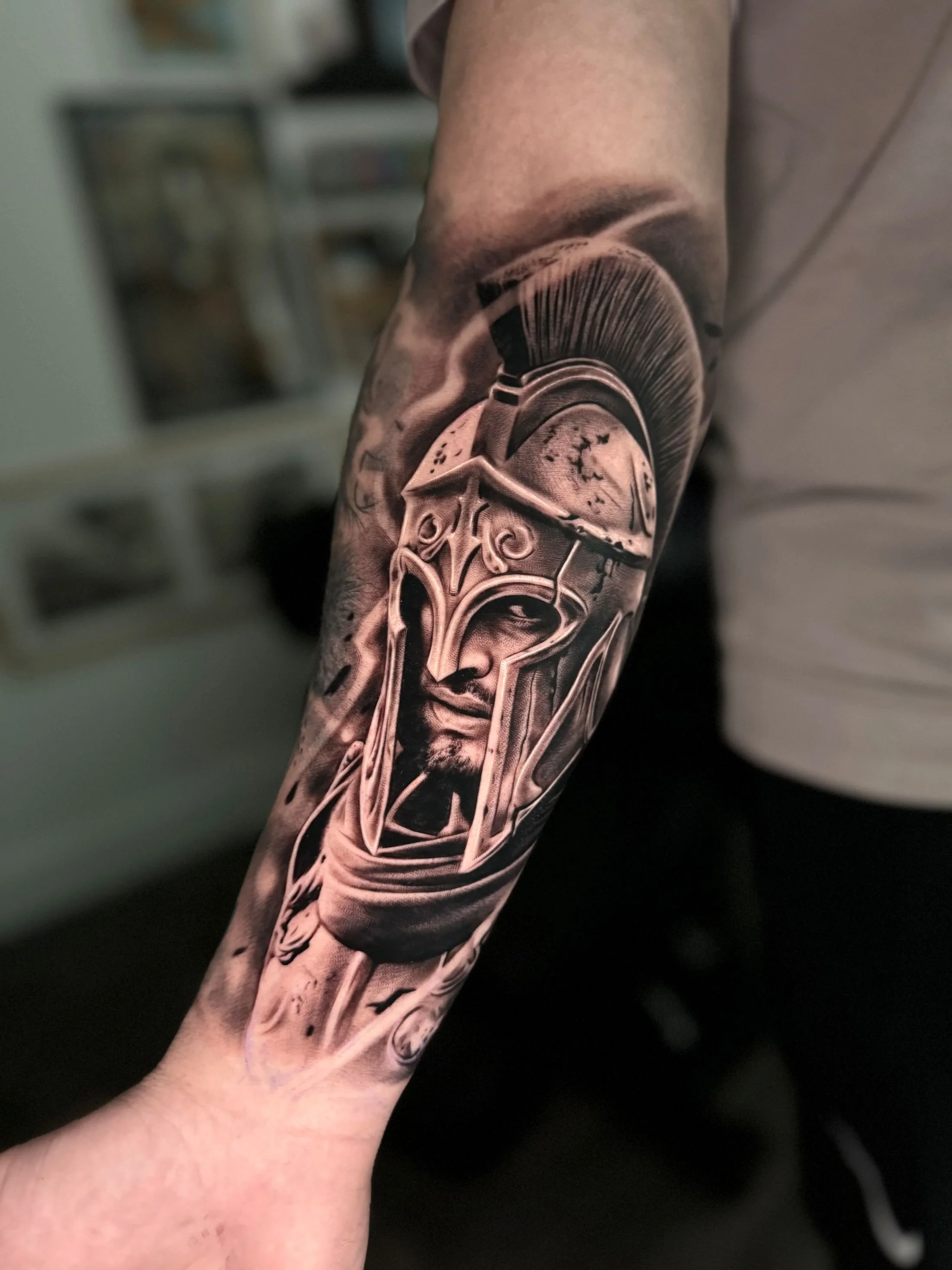 ciaran-harrington-spartan-helmet-black-and-grey-tattoo-cambridge.jpg