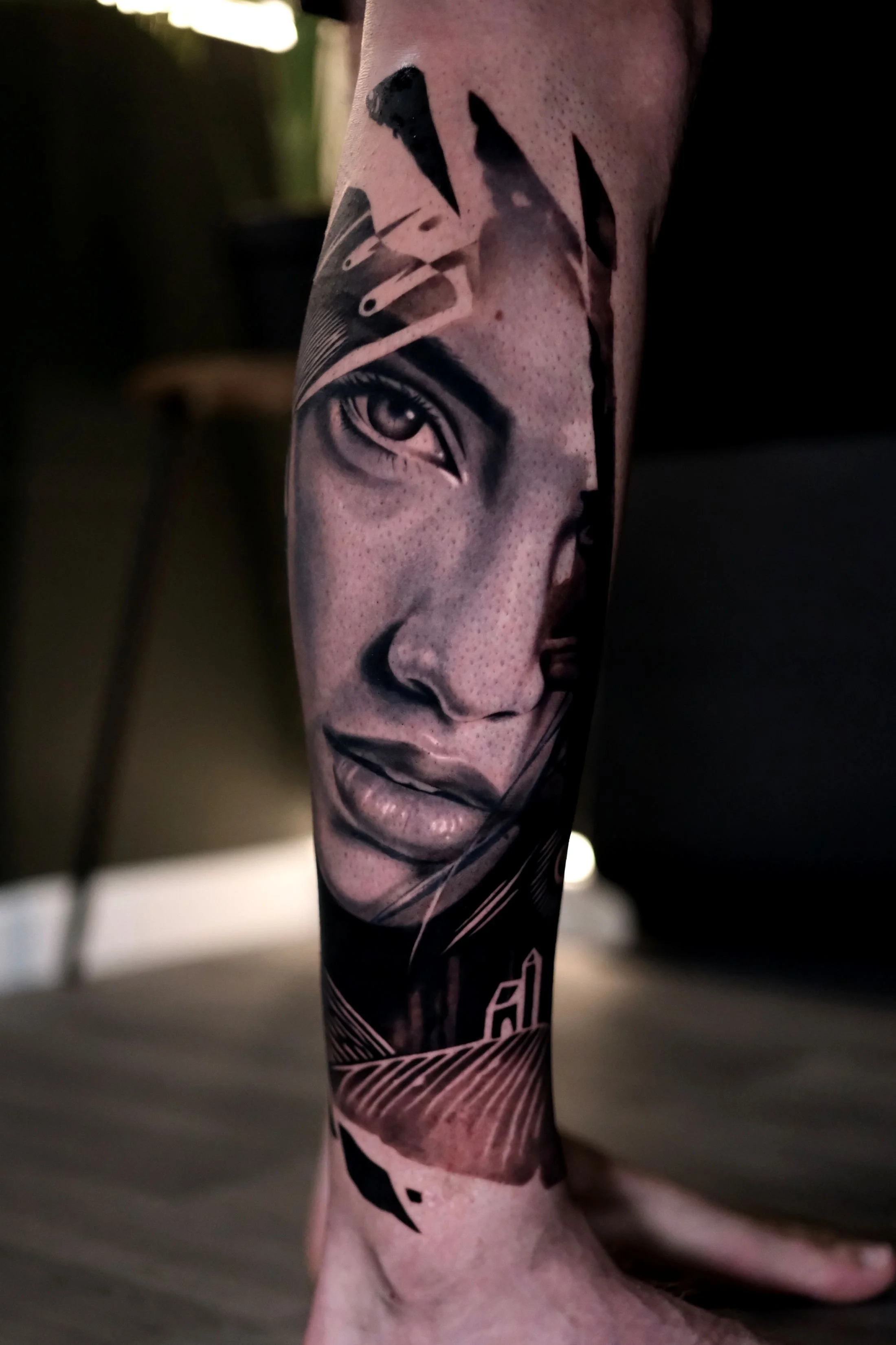 Detailed black and grey abstract lady face with hight contrast graphic elements. Done by Cambridge tattoo artist Ciaran Harrington