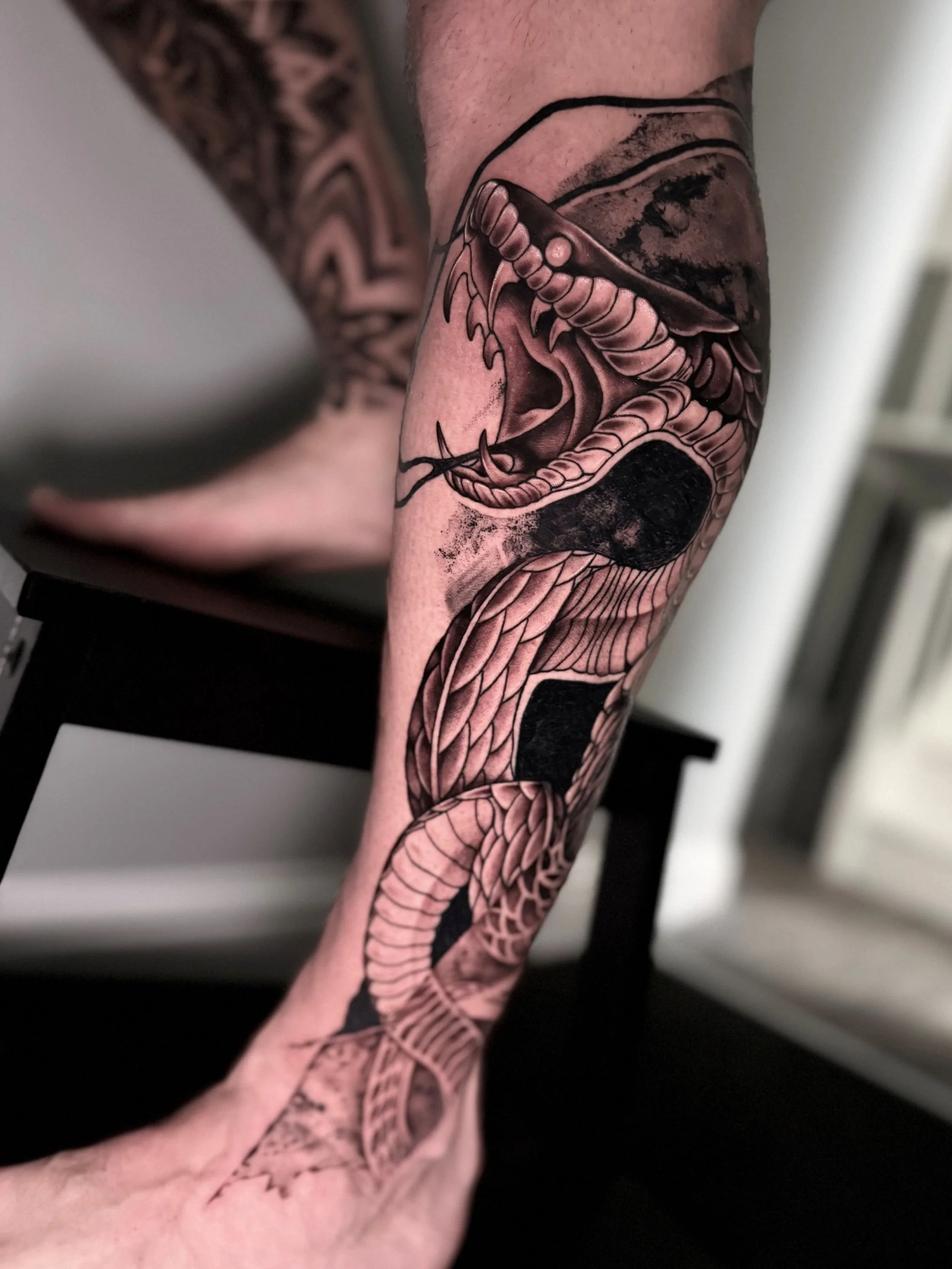 ciaran-harrington-snake-abstract-black-and-grey-tattoo-cambridge.jpg