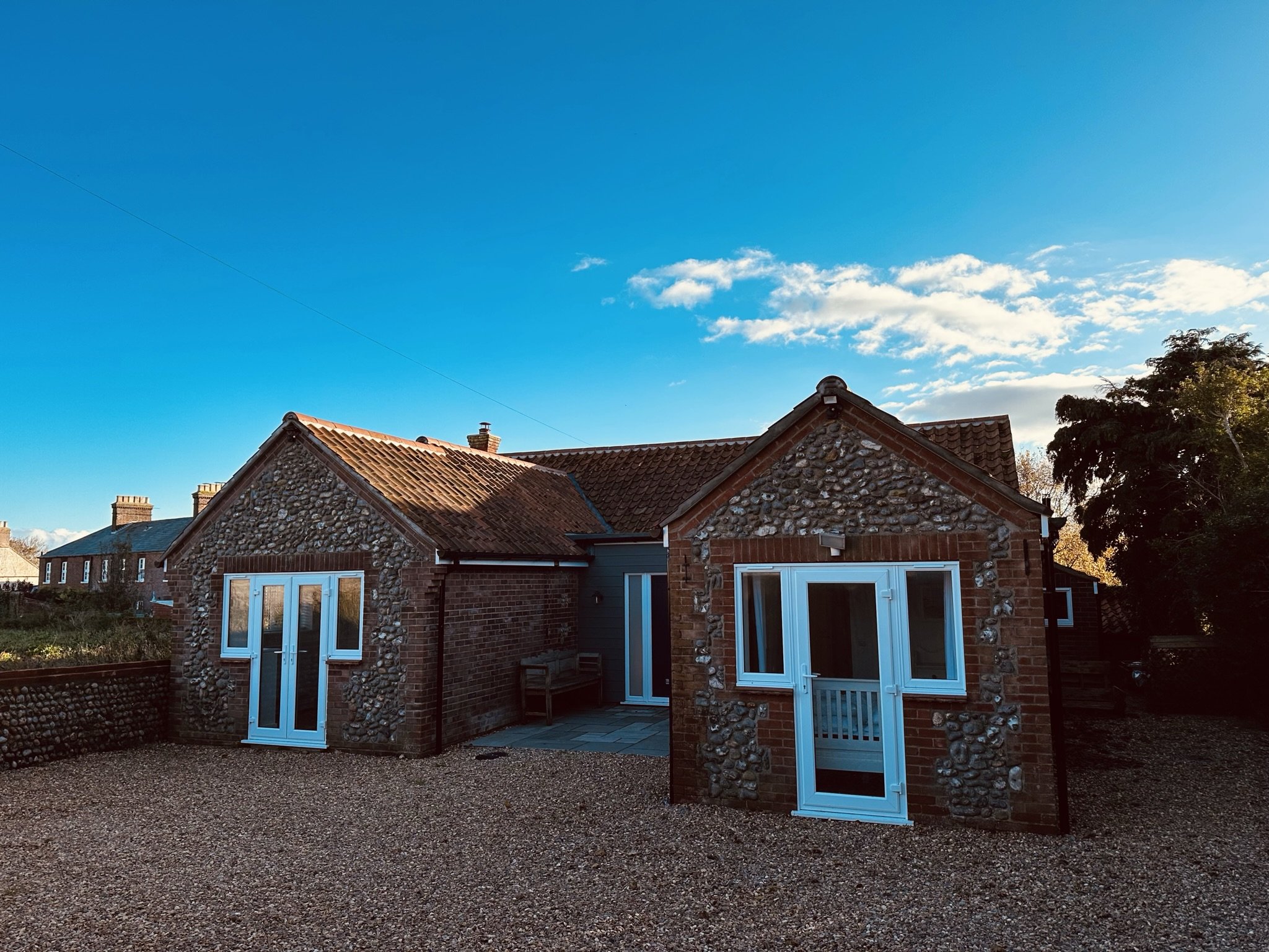 Bromholme Cottage, Bacton, a beautiful flint-fronted cottage, just a 2 minute walk to the beach, in a quiet location on the North Norfolk coast.