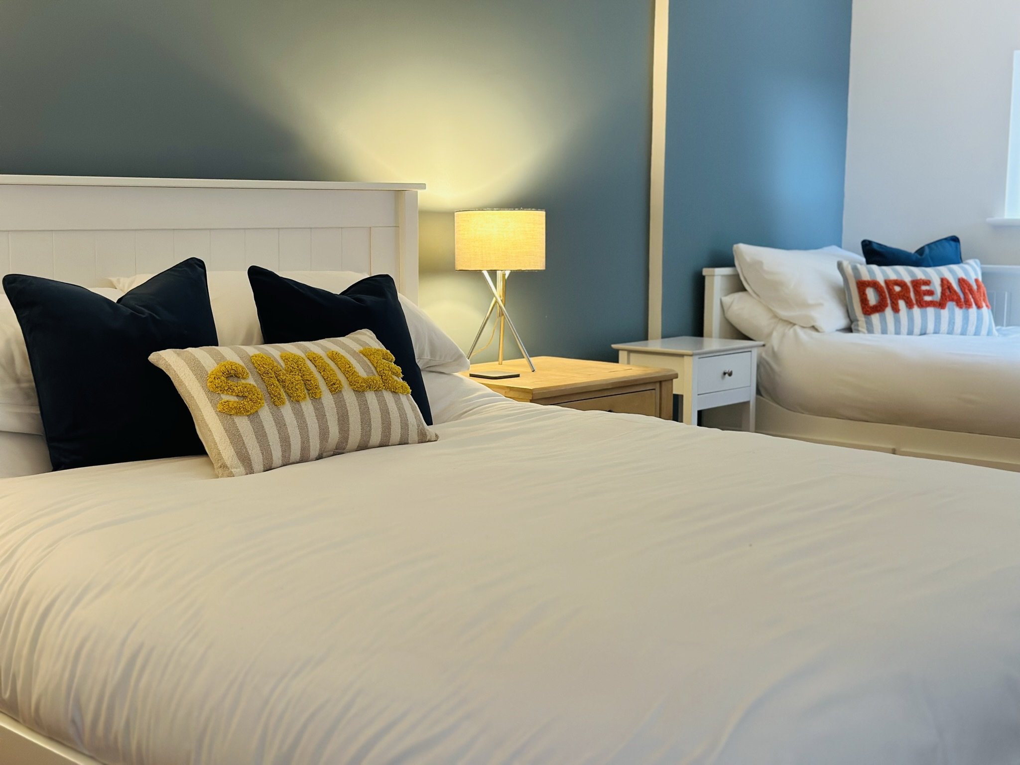 MASTER BEDROOM - Spacious room with one kingsize bed and additional single bed to one side.