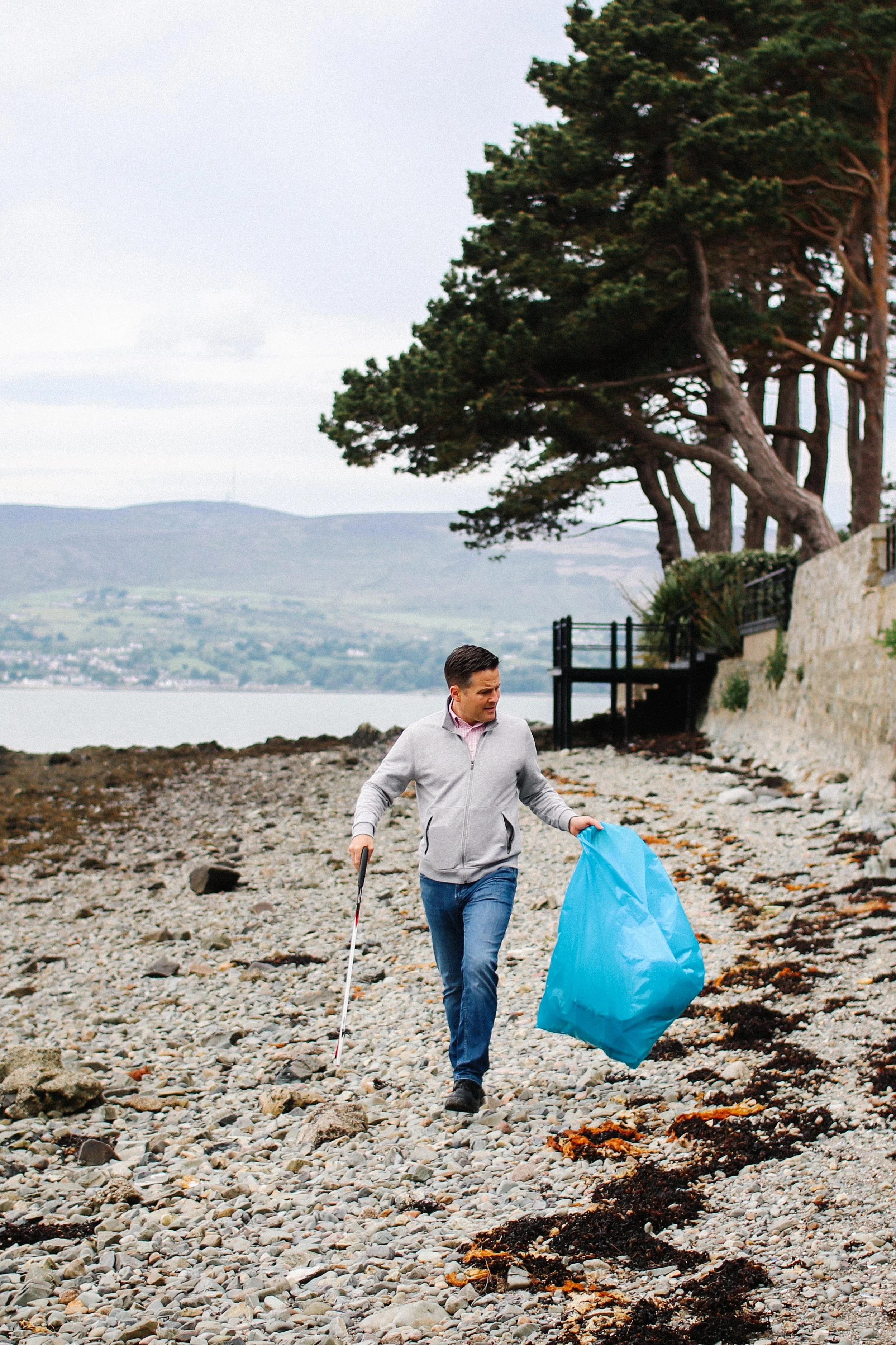 Man on Beach for Litter Pick B - Corp