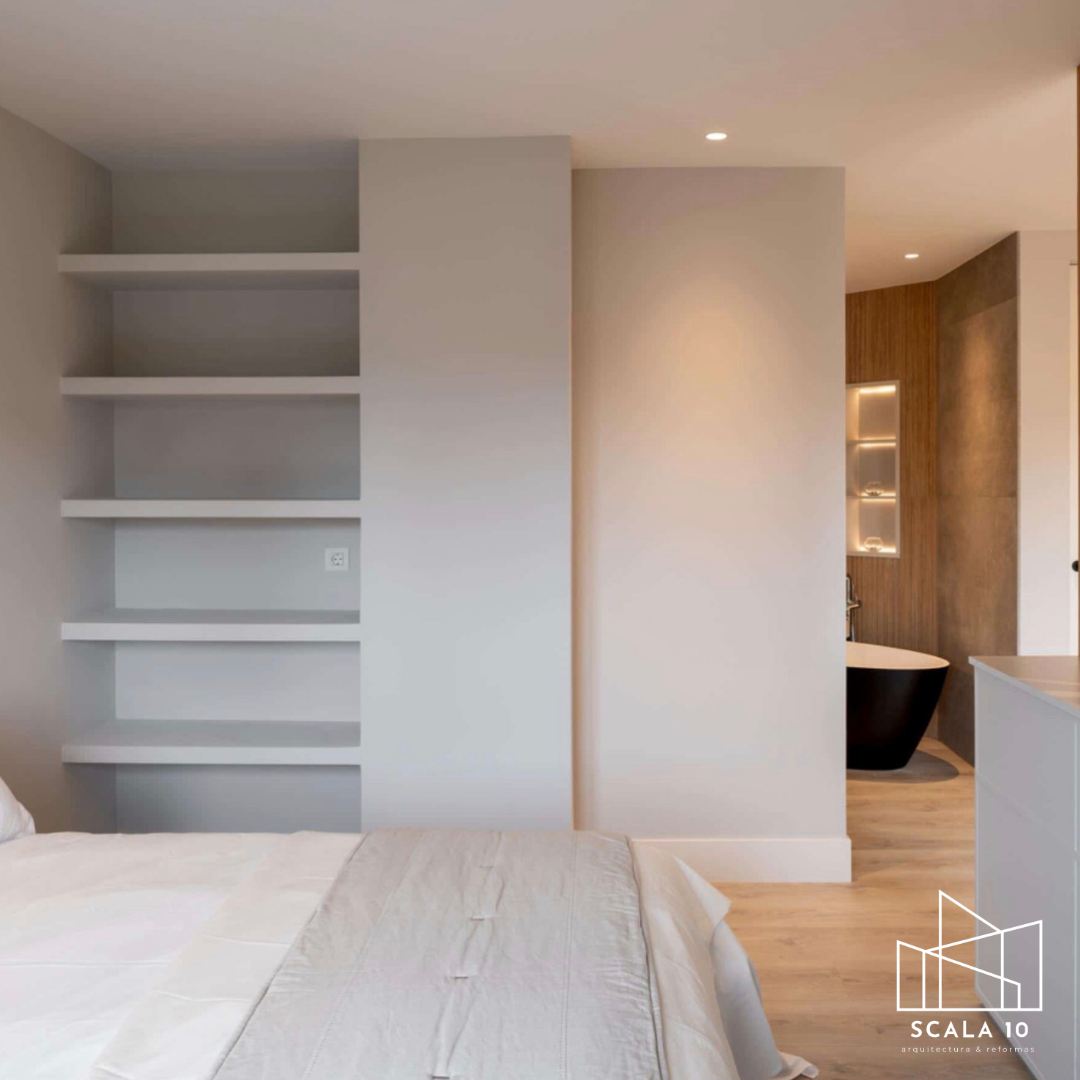 Habitación moderna con litera y una zona de baño con lavabo y bañera estilo independiente en el fondo.