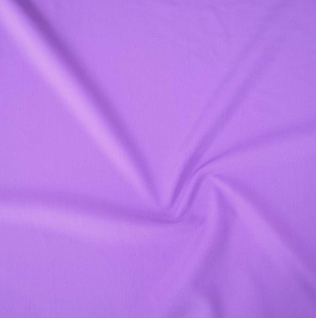 Close-up of purple fabric with a twisted fold.