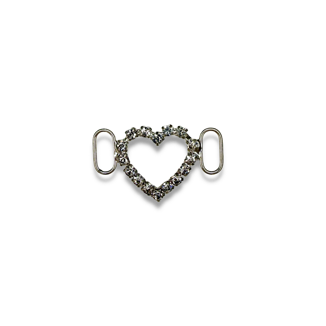 Heart-shaped jewelry piece with rhinestones and oval links on each side, against a white background.