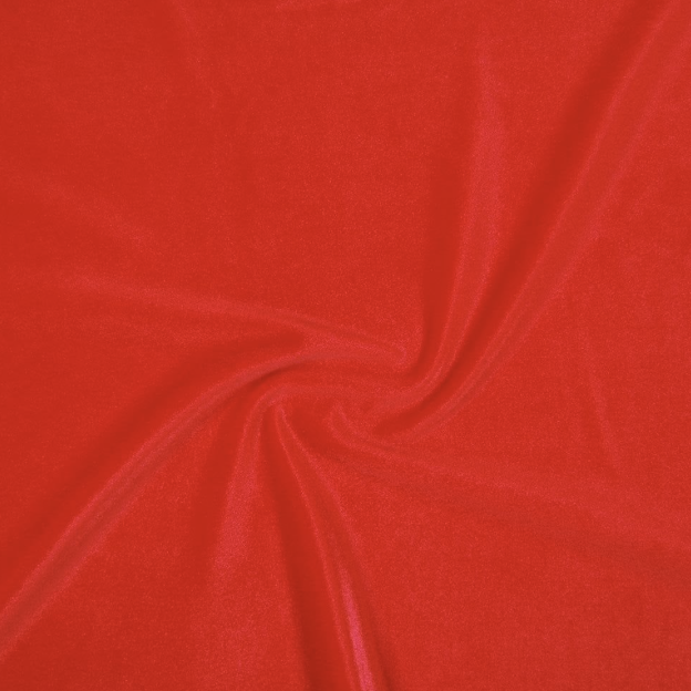 Red fabric with a swirling pattern.