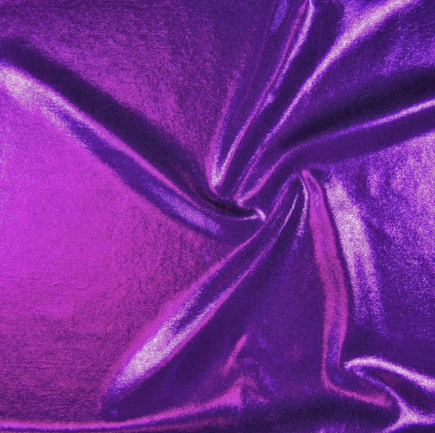 Close-up of shiny purple satin fabric with folds and creases.