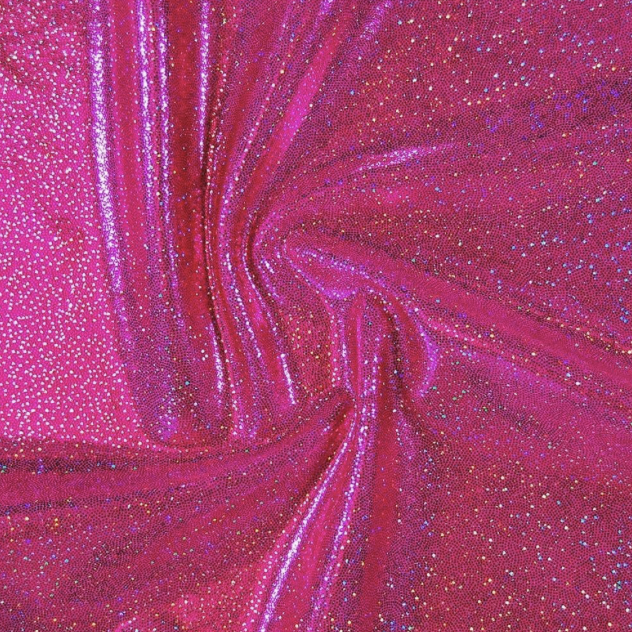 Close-up of pink fabric with glittery, swirling pattern.
