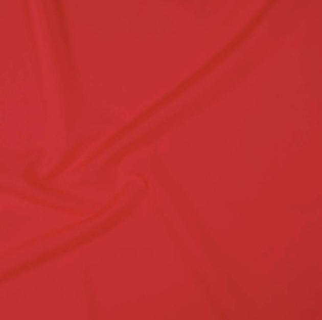 Close-up of a red surface with faint lines.