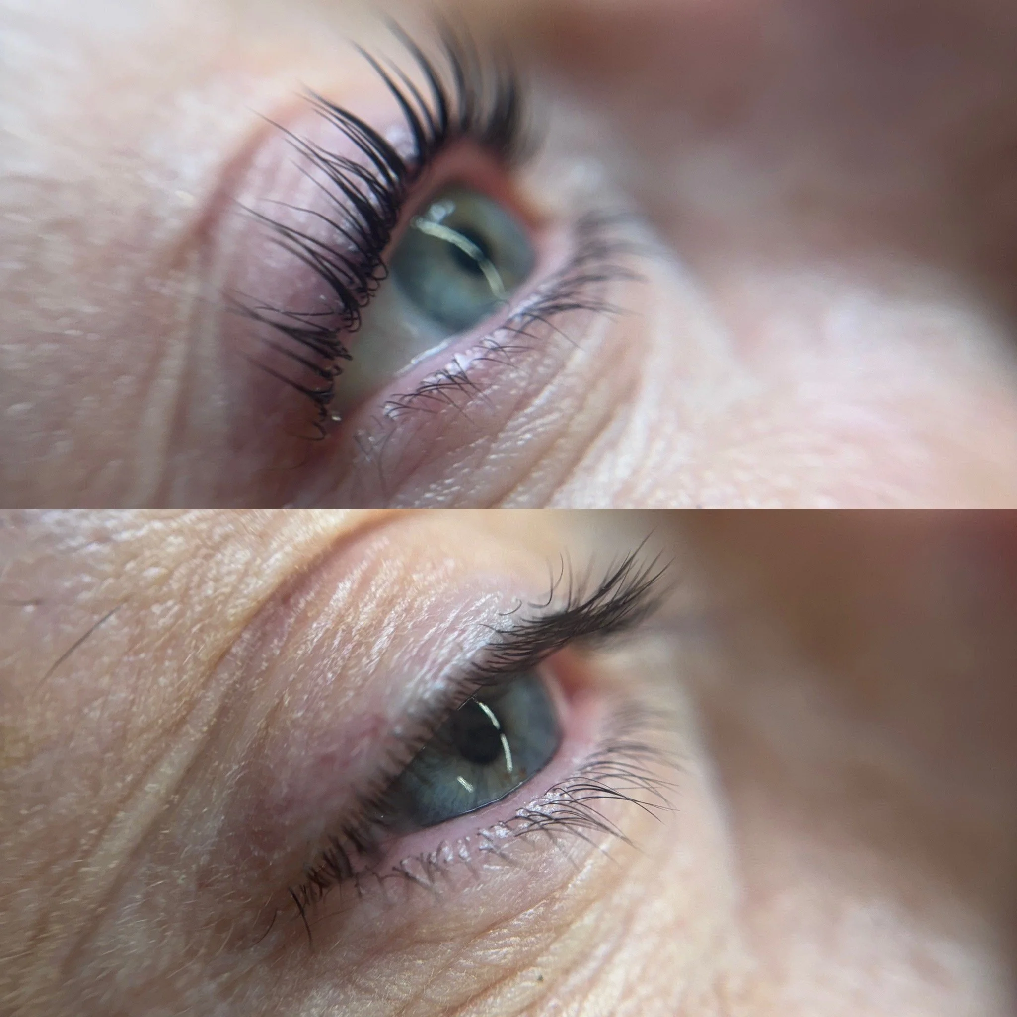 Close-up of a person's eye, showing detailed eyelashes, eyelid, and blue-green iris.