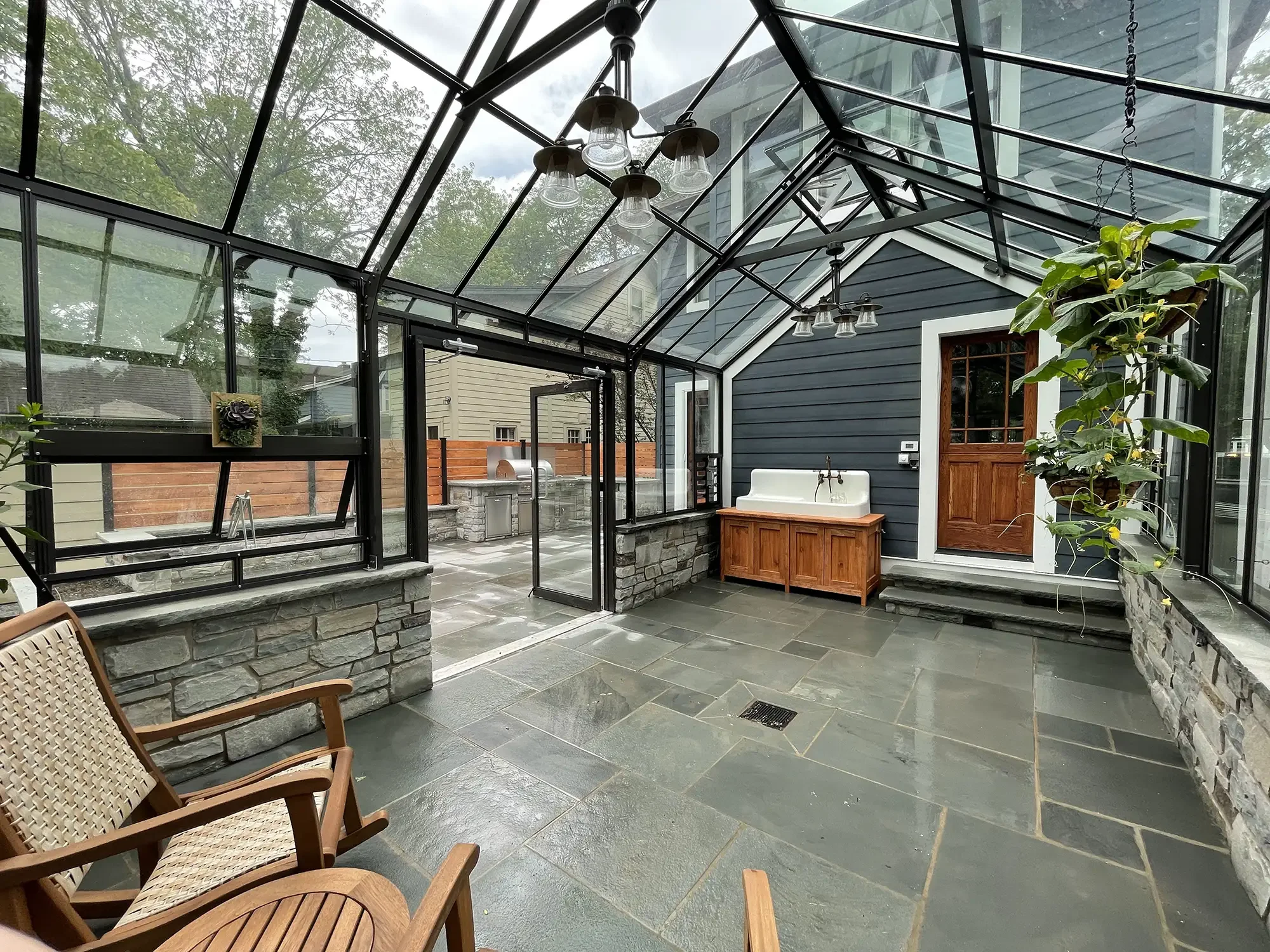 Hometown-Design-Build_Our-Work_Greenhouse-Outdoor-Kitchen-11.webp