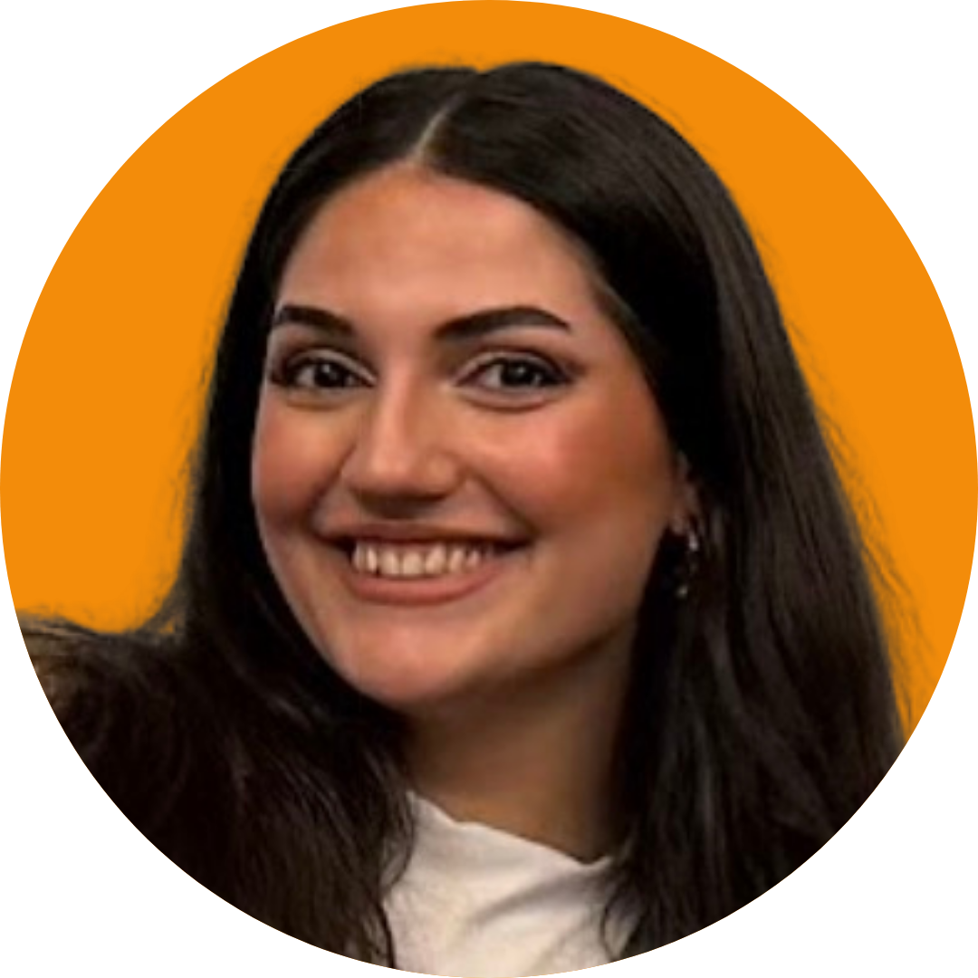 Portrait of a smiling woman with long dark hair.