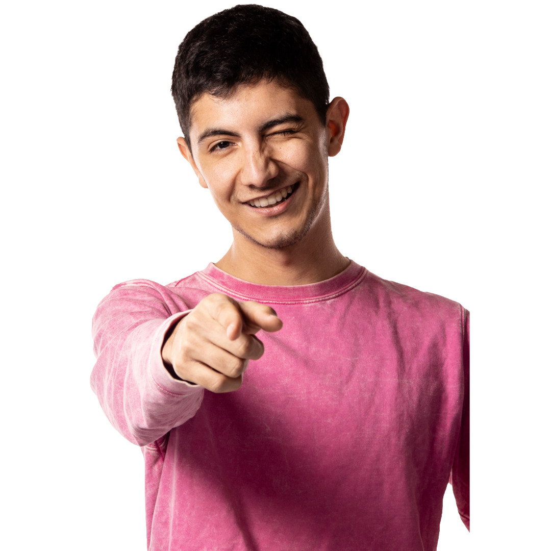 A smiling man pointing towards the camera.