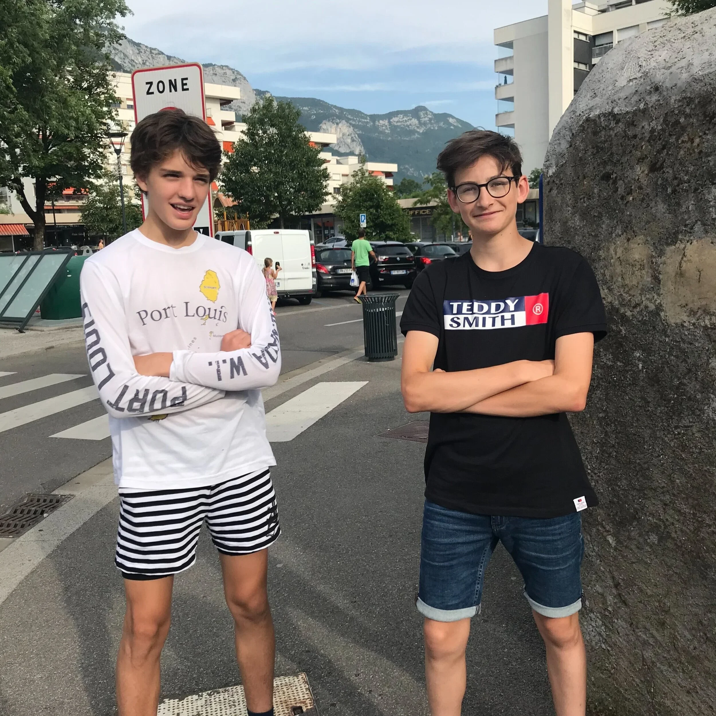 Two men standing outdoors.