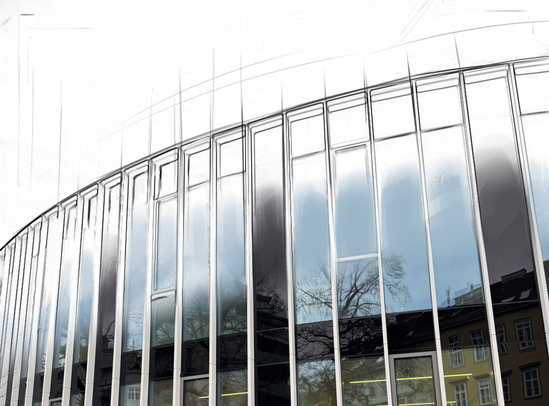 Moderne Bürogebäude mit großen Glasfenstern und reflektierendem Himmel