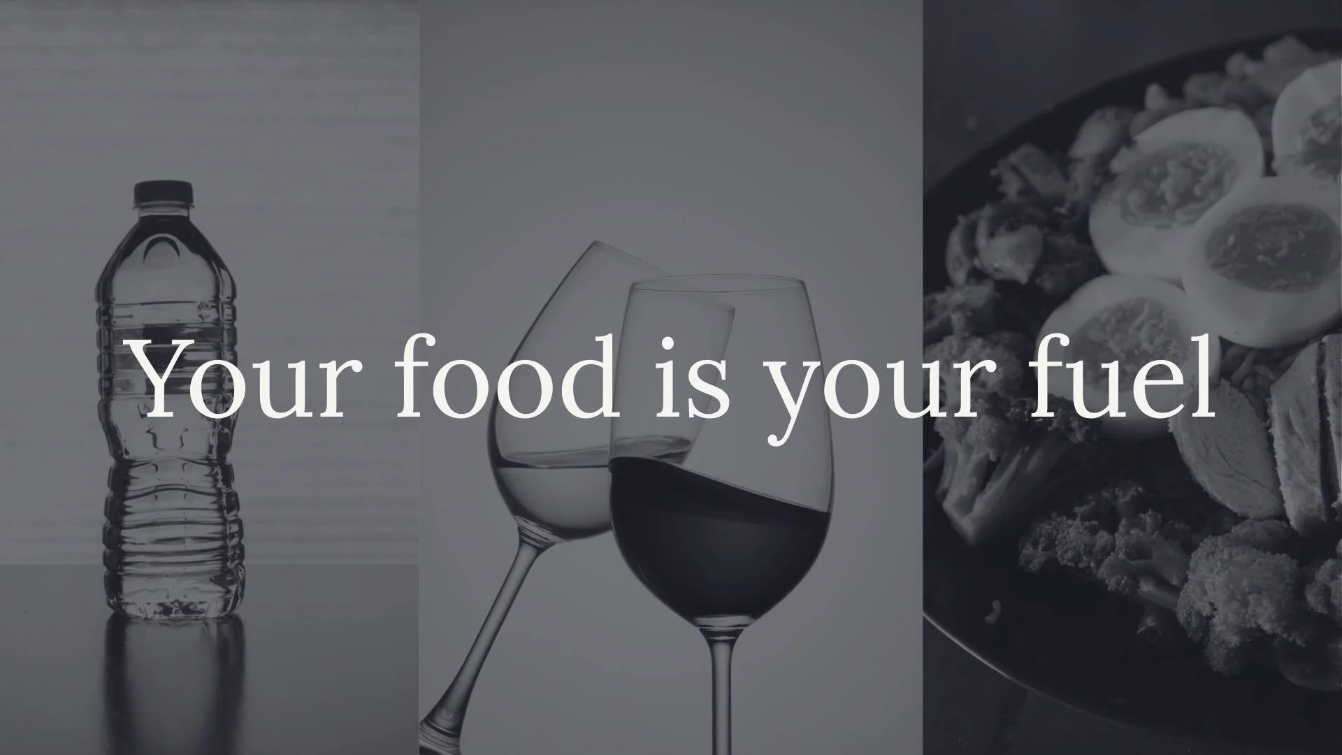 Image of a water bottle, wine glasses and a healthy meal