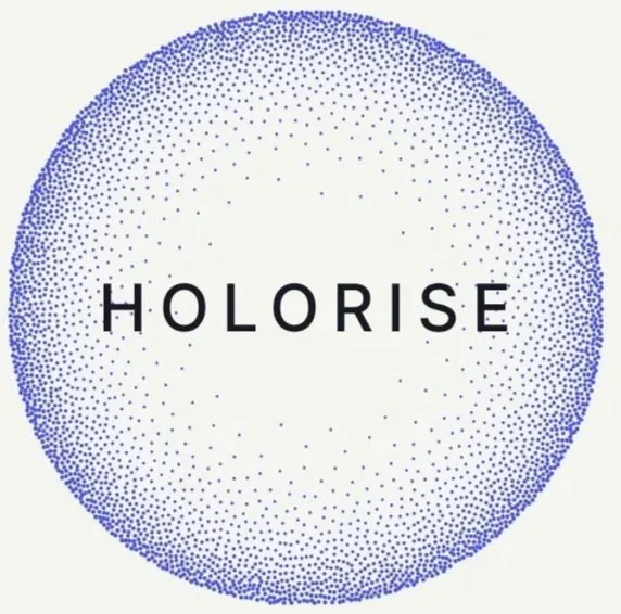 A circular pattern of small blue dots surrounding the word 'HOLORISE' in black capital letters.