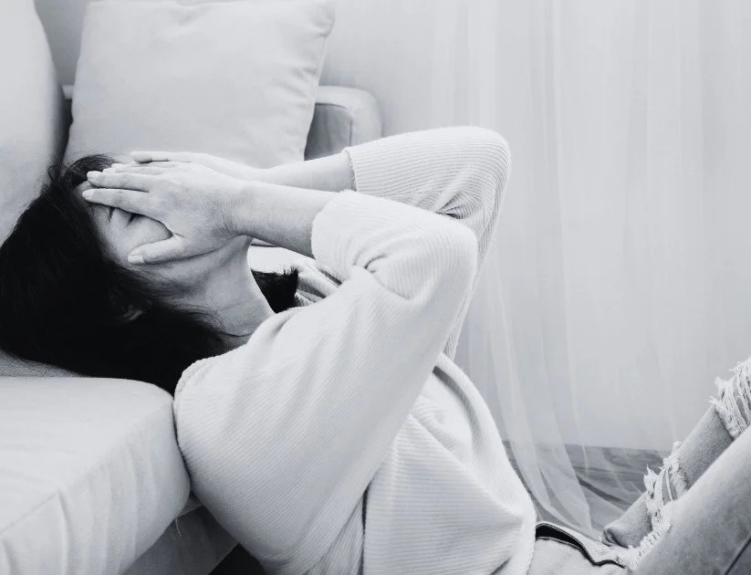 Woman feeling overwhelmed and depressed