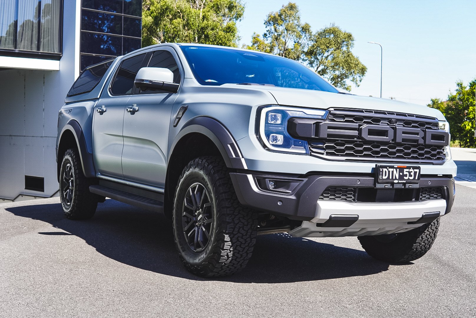 Silver Ford pickup truck after maintenance detailing at Jidosha