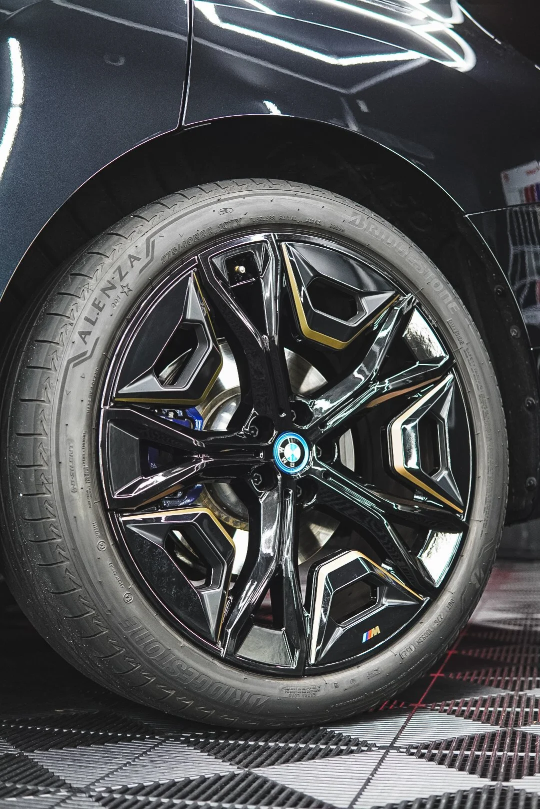 Close-up of a black BMW car wheel