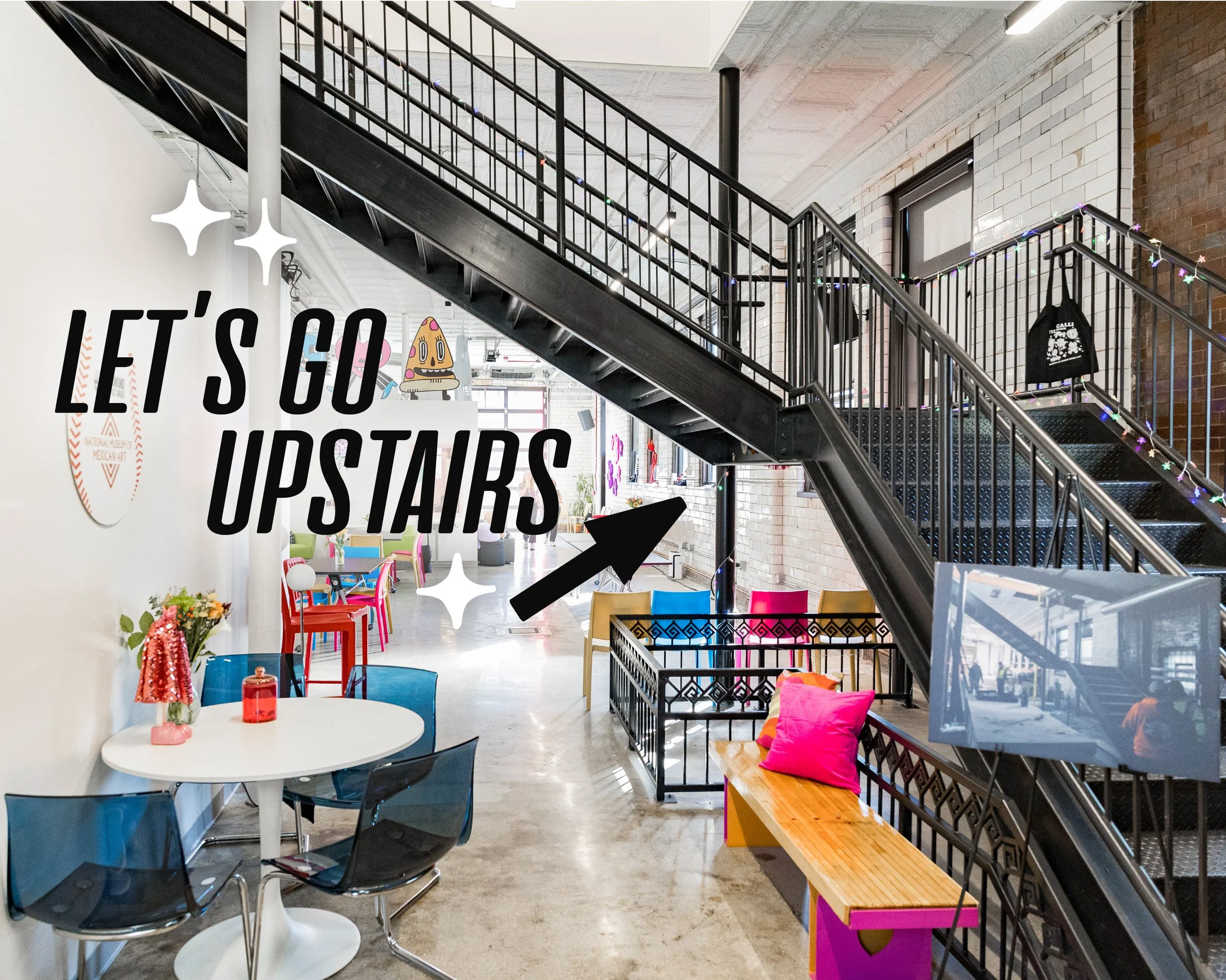 Graphic text reading "Lets go Upstairs" is visible over an image of a large black staircase. Several seating options are nearby, including a table with clear blue chairs and a bench.