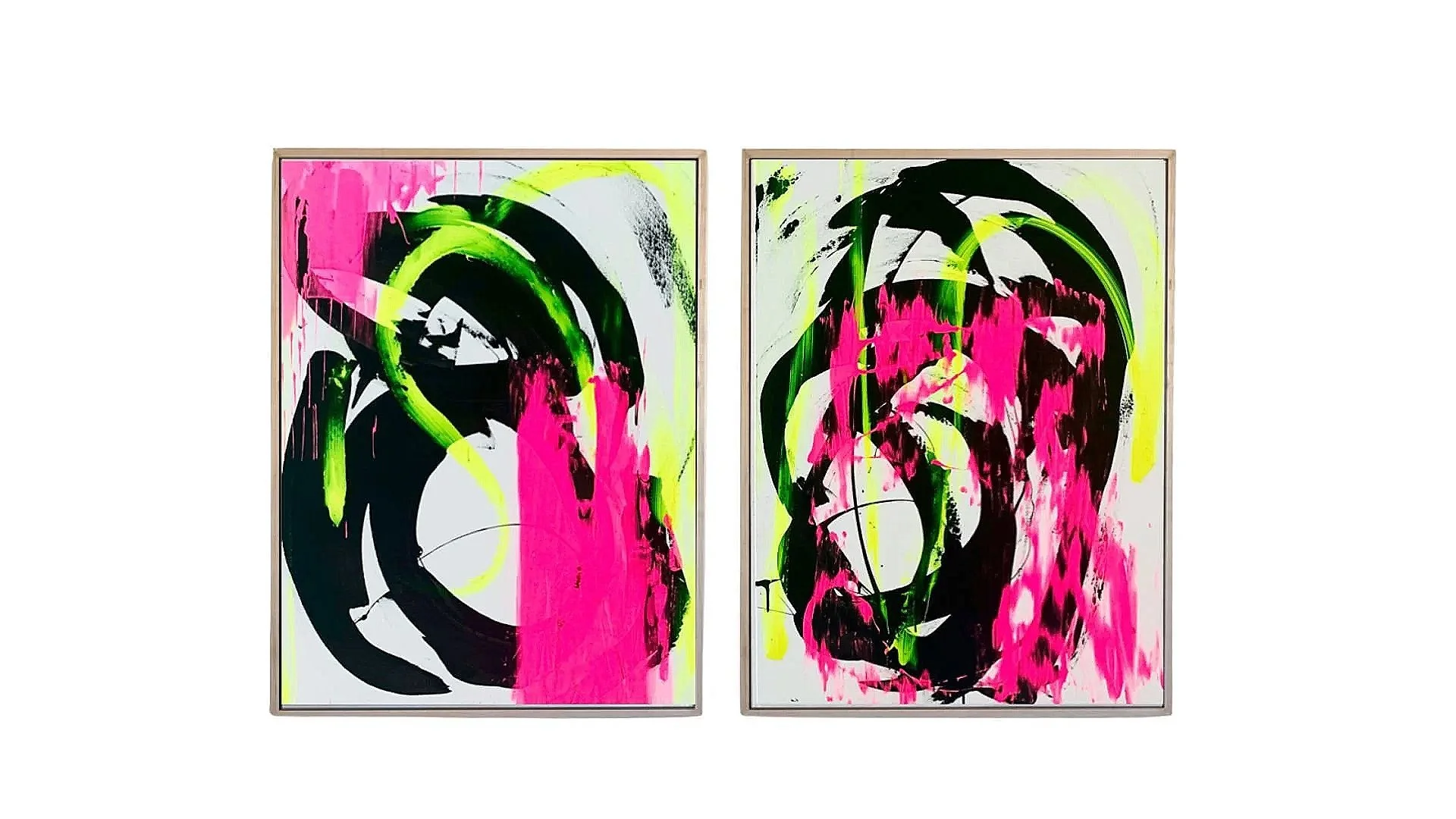Two abstract paintings with black, pink, and neon yellow-green brushstrokes, framed and hung side by side.