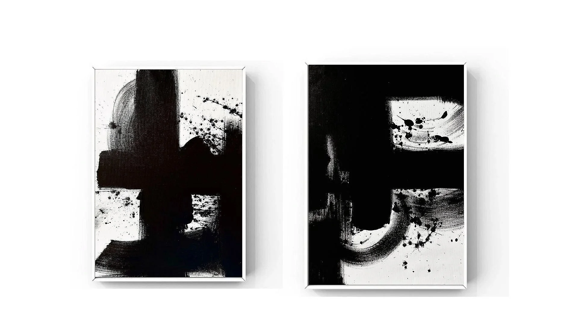 Two abstract black and white paintings with ink splatters and brush strokes, framed and hung side by side on a white wall.