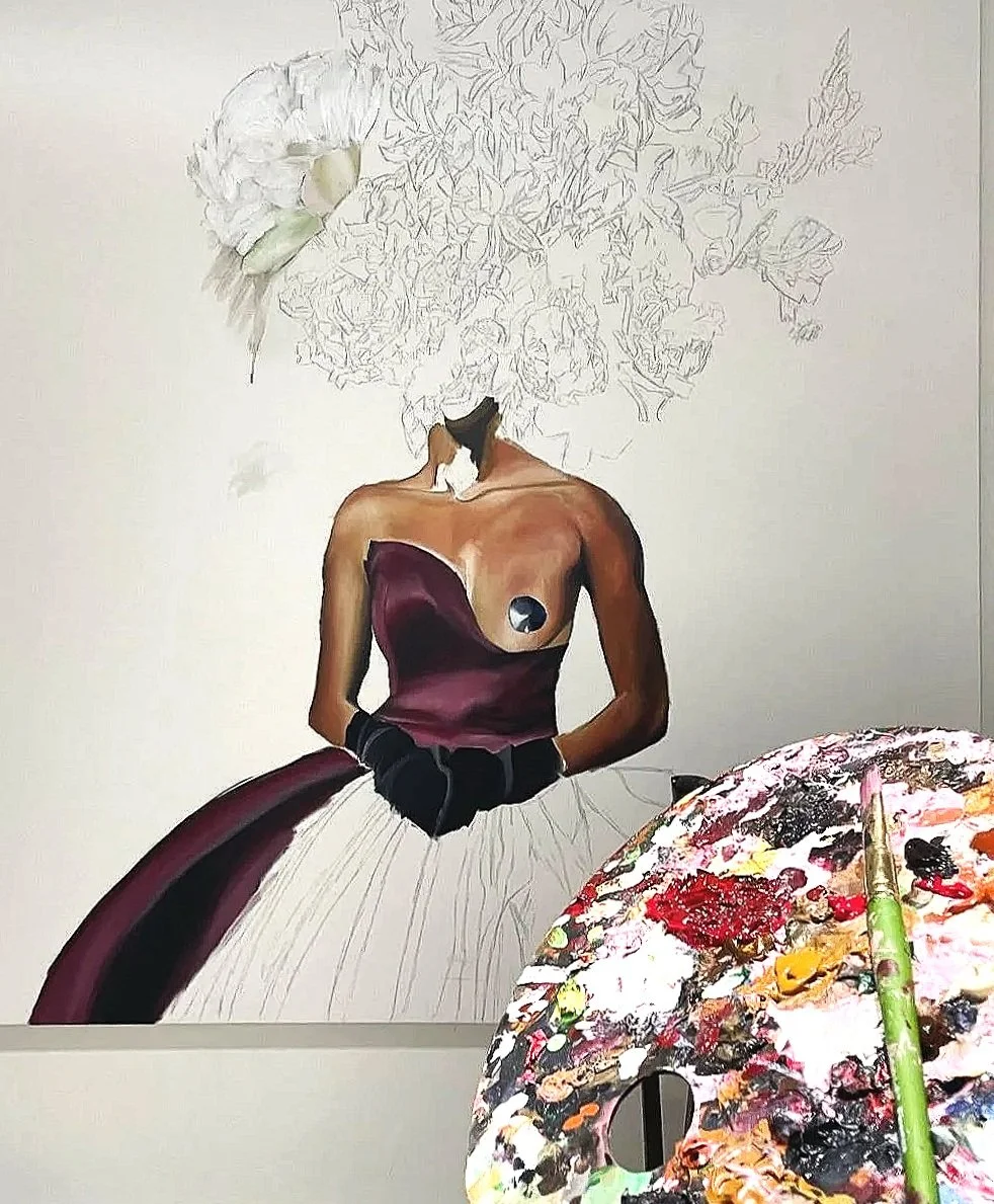 A painting in progress depicting a woman in a strapless maroon dress with a black waist detail. Her face is missing, and her head is replaced by a large floral bouquet. The background is plain, and an artist's palette with paint and a brush is visible in the foreground.