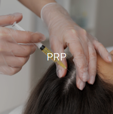 Person receiving a PRP injection in the scalp with a healthcare professional wearing gloves.
