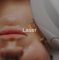 Person receiving a laser treatment on their face, close-up of the procedure being performed with a laser device.
