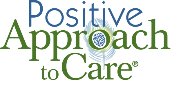 Graphic with the words 'Positive Approach to Care' in colorful text, featuring a brain icon in the center.