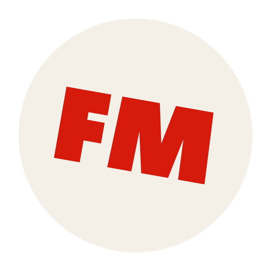 Radio station logo with red letters 'FM' on a white circle background