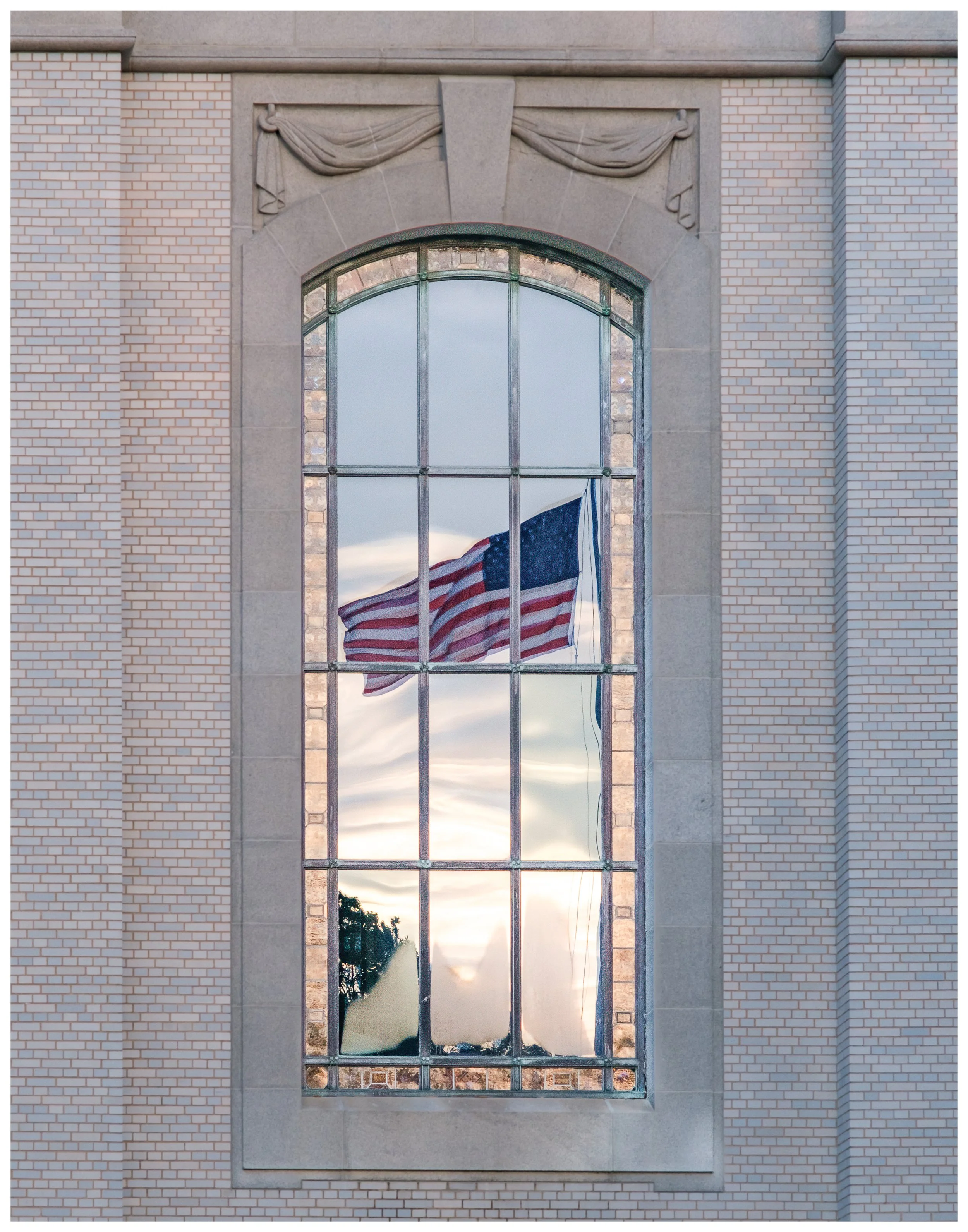 Flag Reflection in Chapel Window