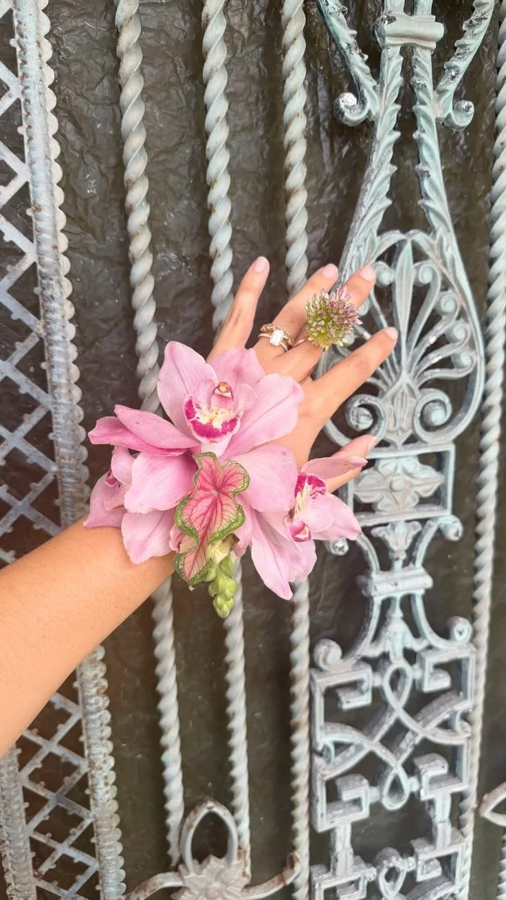 Pink modern wedding corsage with orchids.jpg