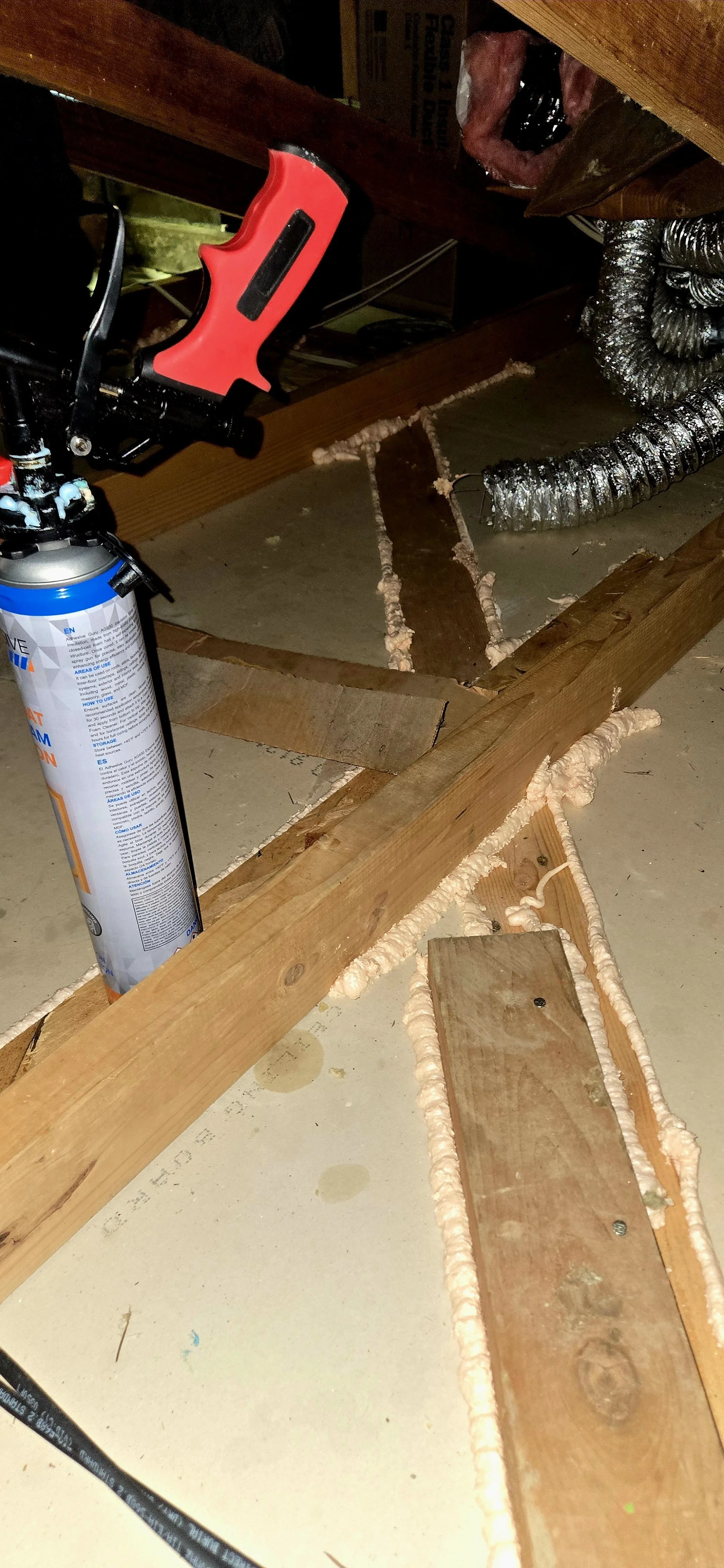 Air sealing around framing in attic.