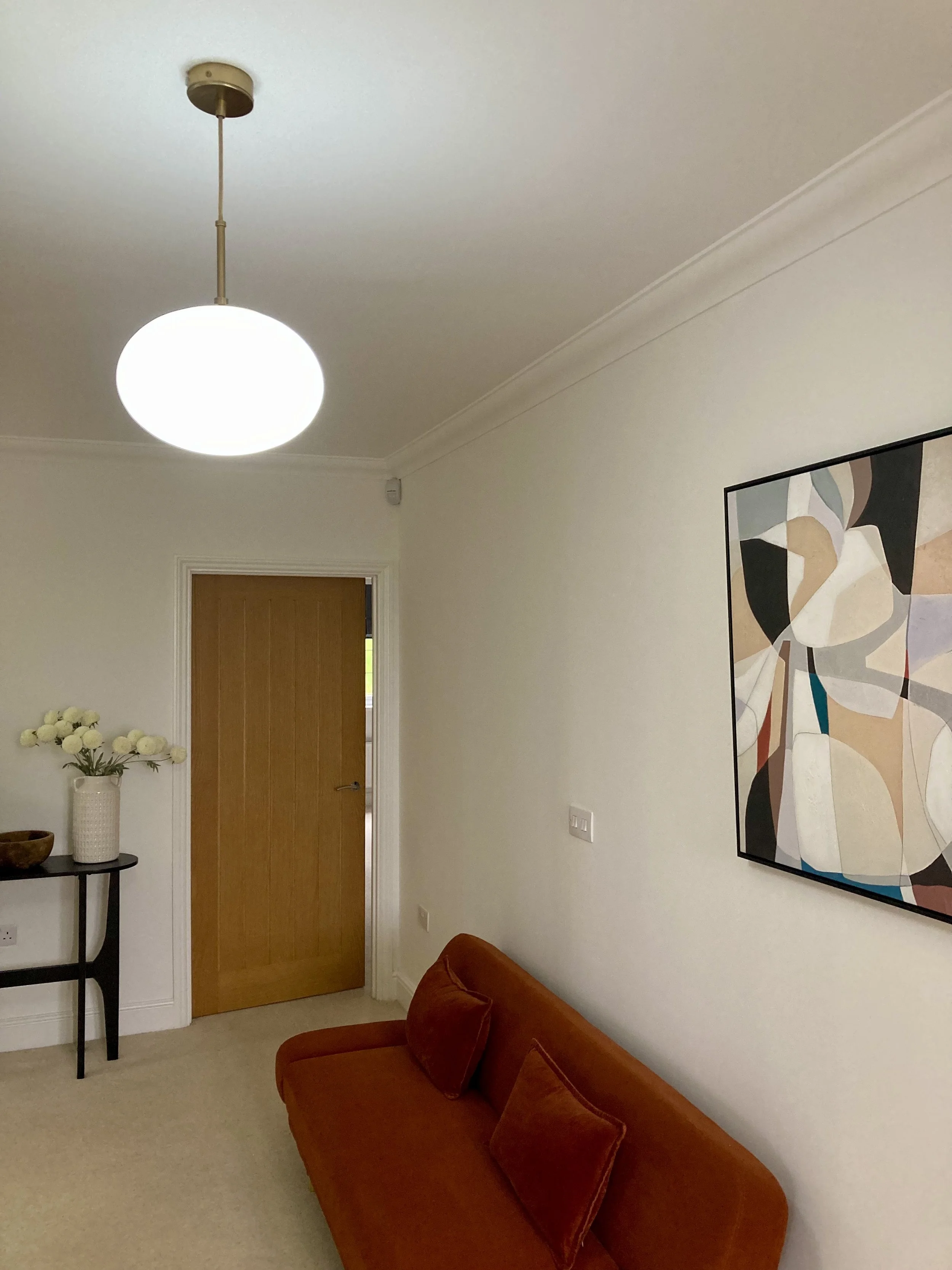 Large white globe pendant installation in Crowborough by professional electrician