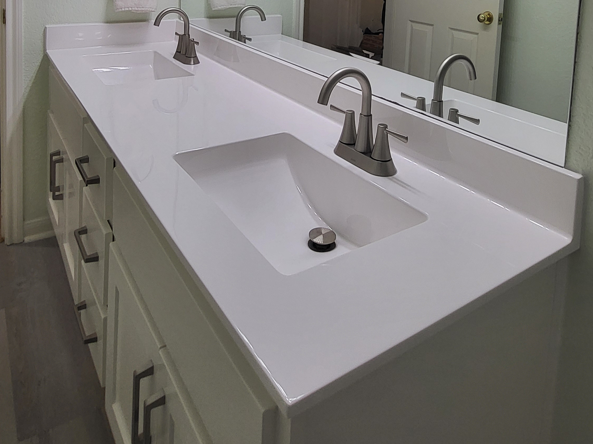 Cultured marble vanity in bathroom remodel in Central Texas