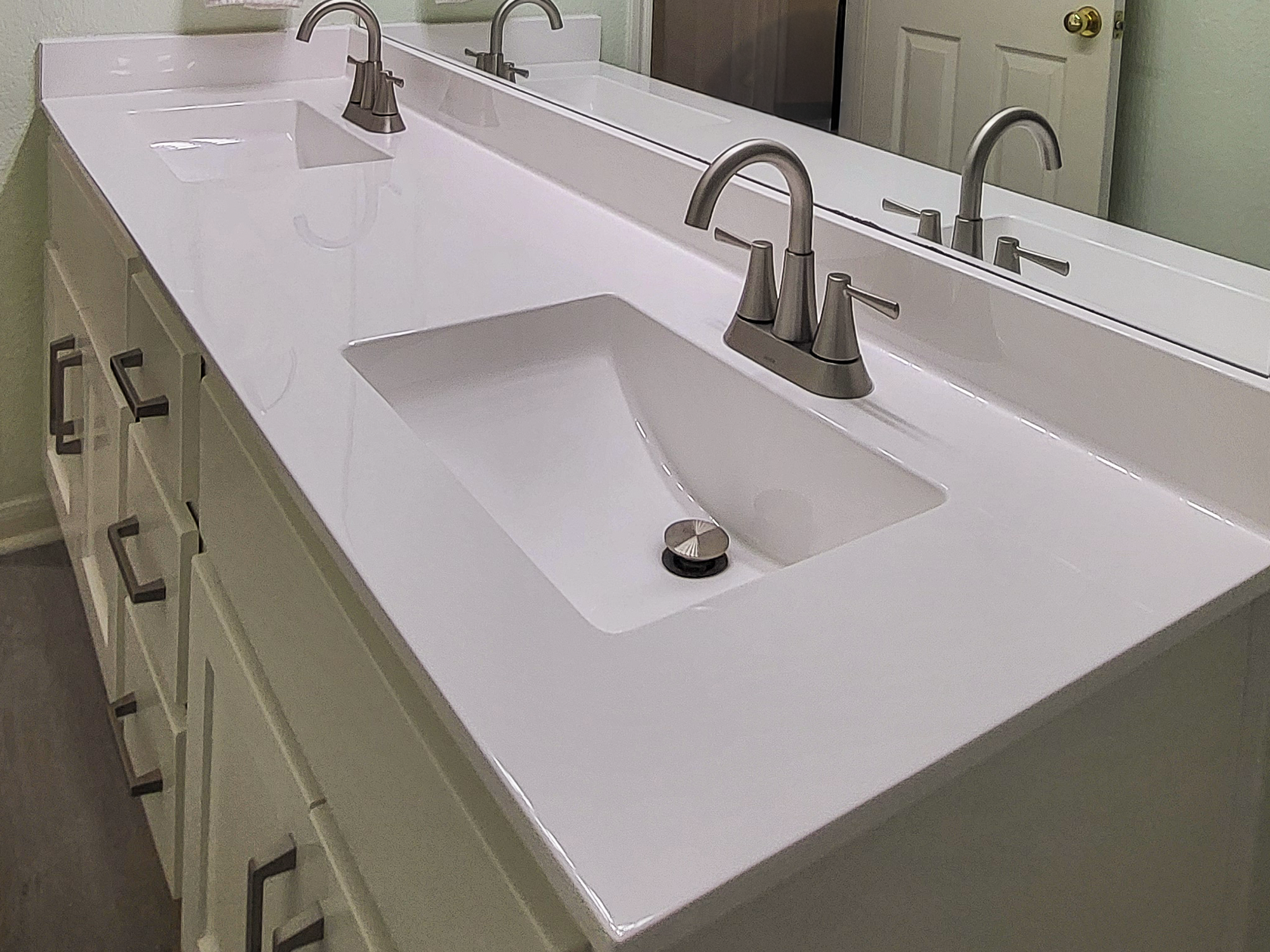 Cultured marble vanity with integral bowl in Central Texas