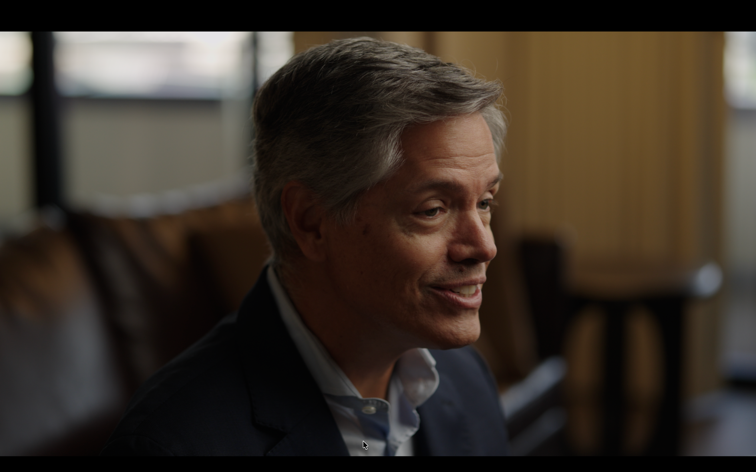 Close up executive interview frame from a CBS documentary production