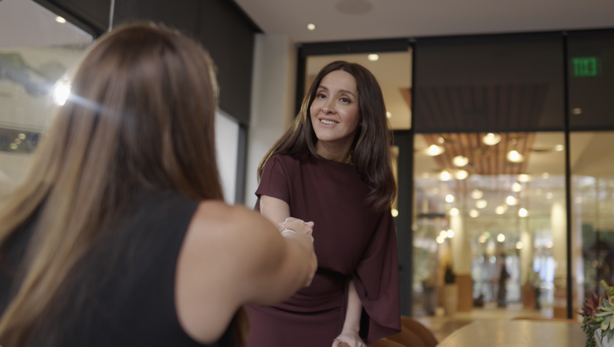 Business professionals connecting during a corporate brand video shoot