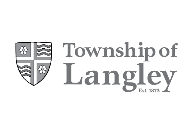 Logo for Township of Langley with a shield emblem and the text 'Township of Langley Est. 1873' in gray on a white background.