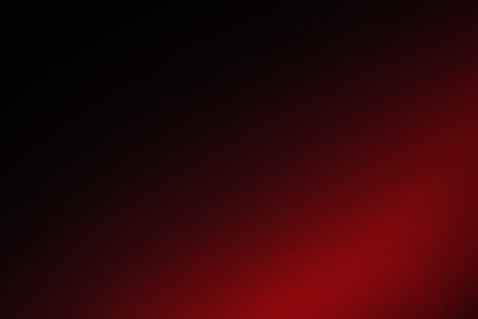 The image is very dark with a gradient of black to red, with no distinguishable objects or features.