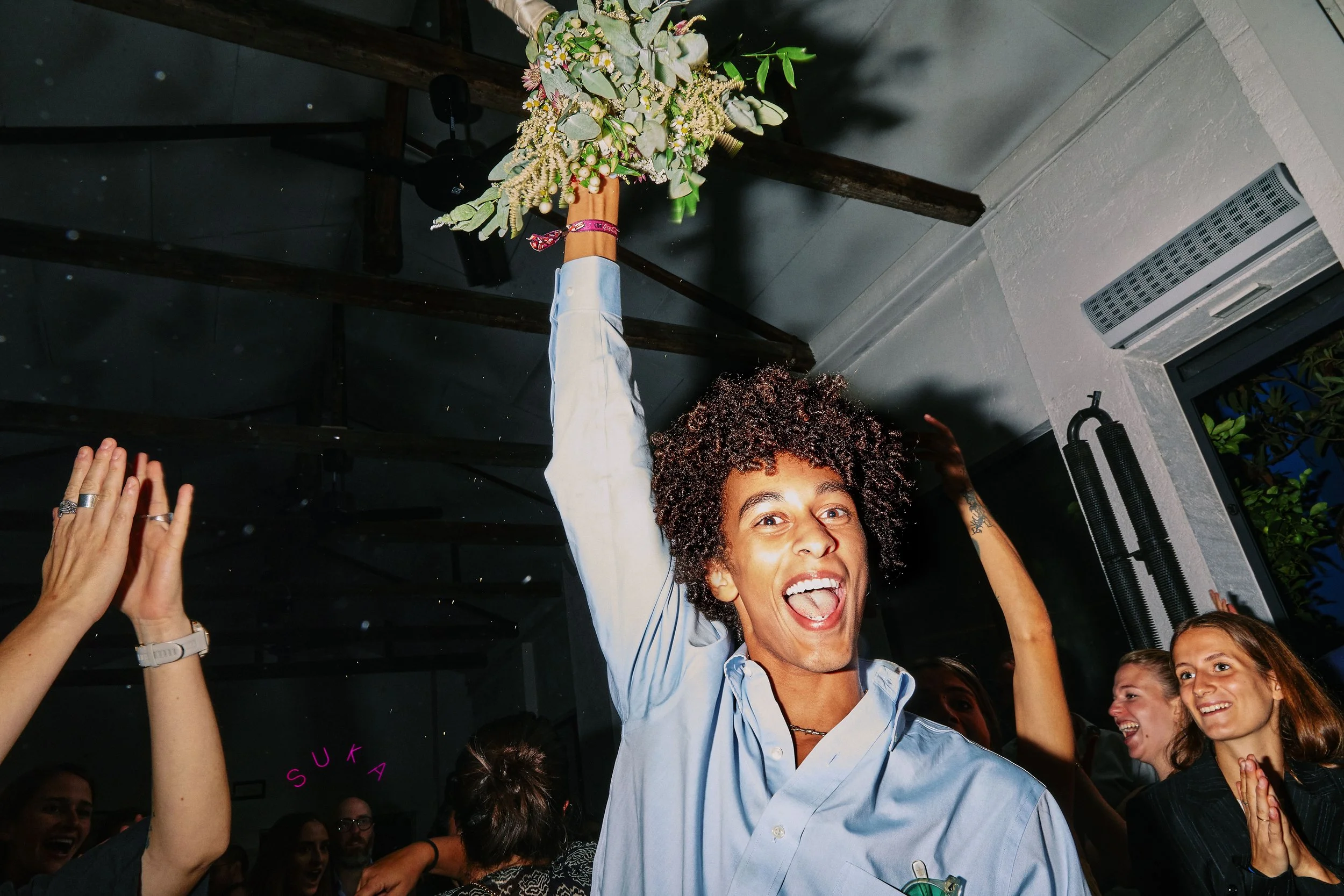 Editorial wedding photography capturing the energy of the celebration