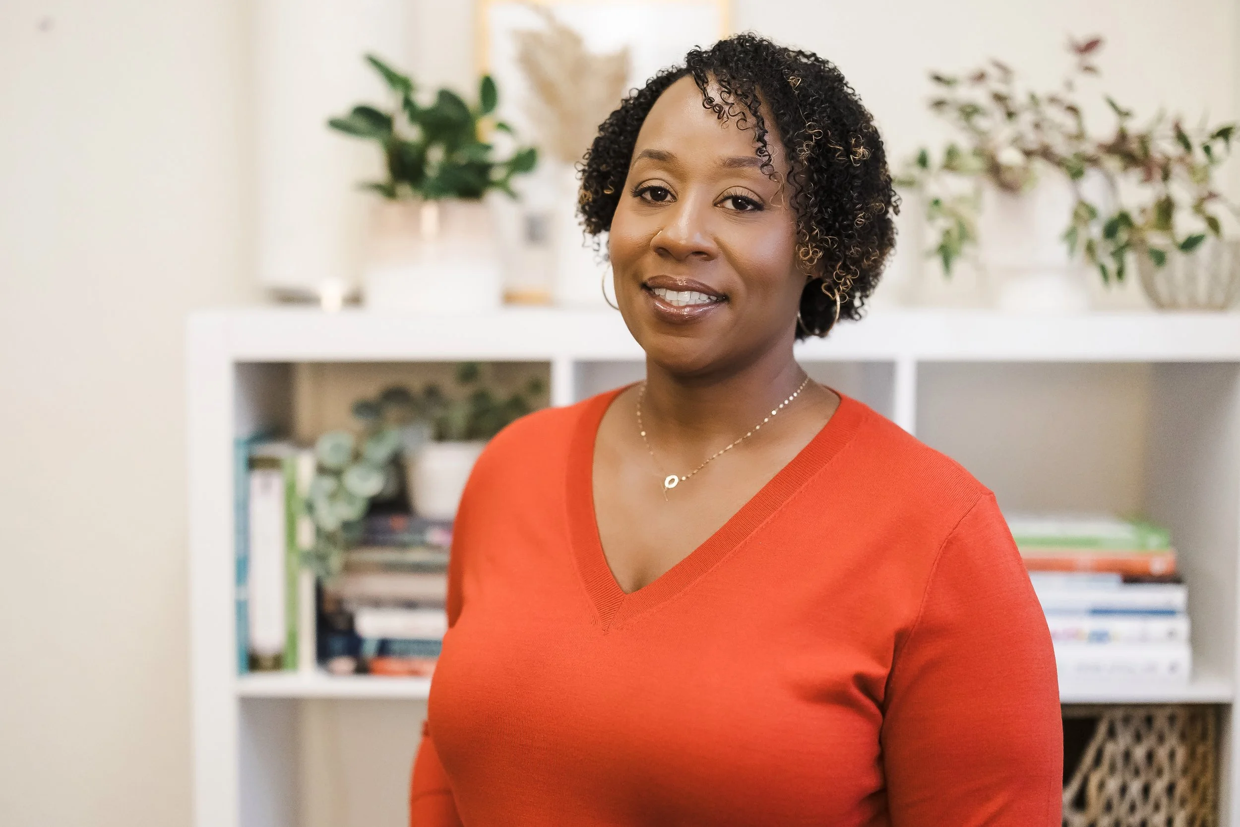 Women smiling in a therapist office
