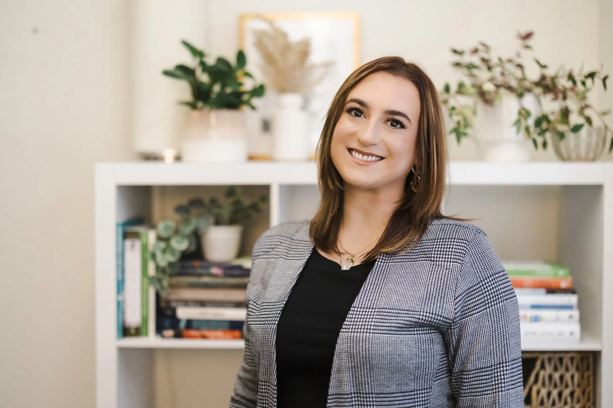 Woman Therapist smiling in therapy office